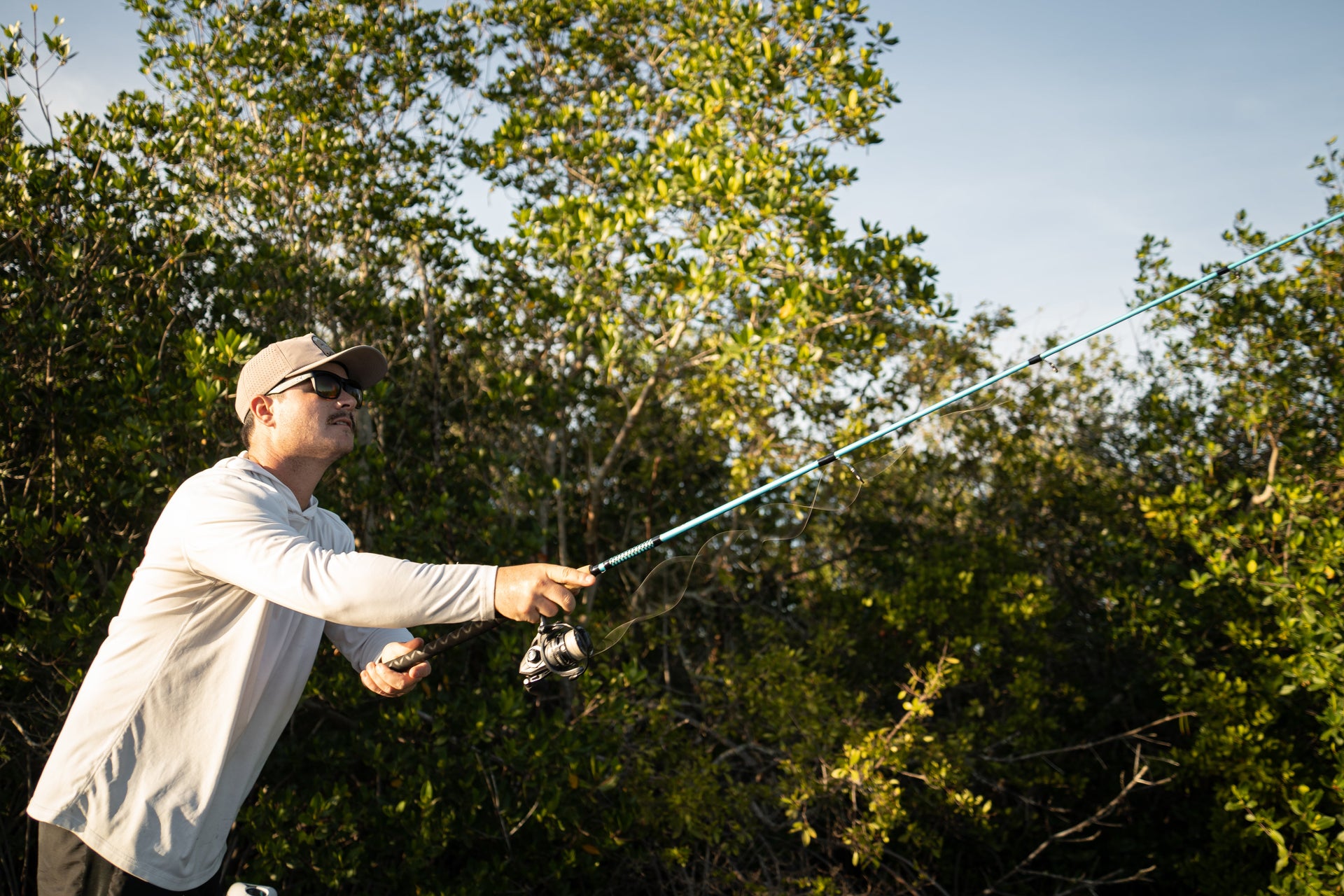 Man fishing with Carbon Inshore Rod