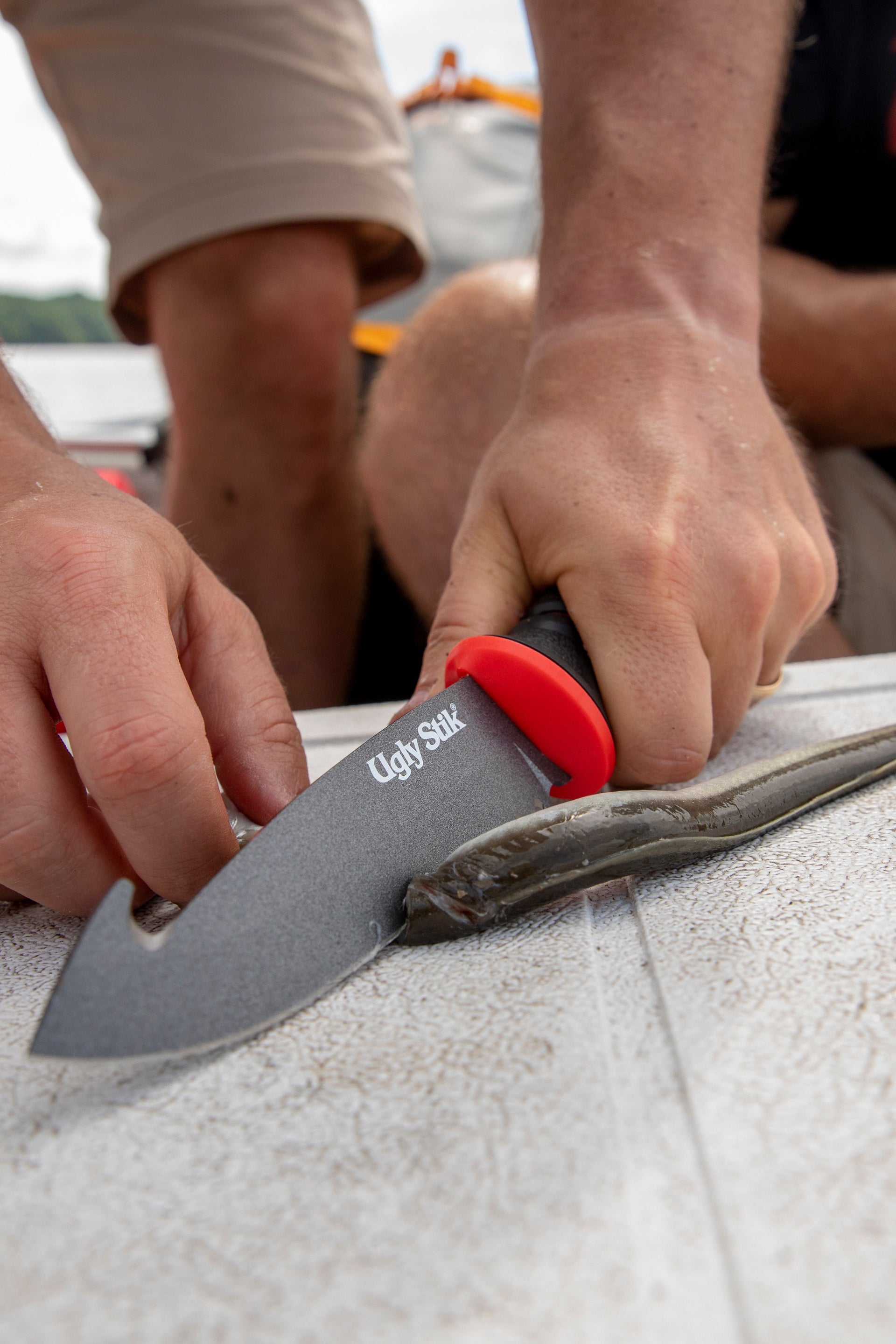 Hand using knife